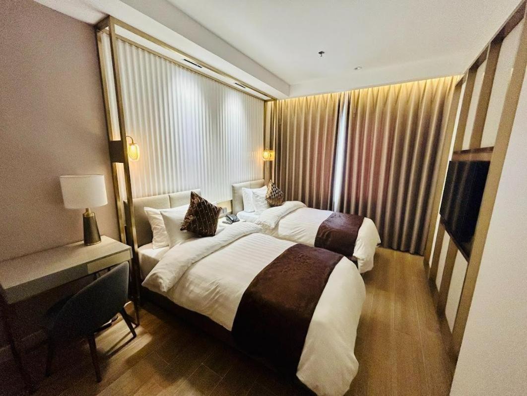 Uma Hotel And Residences Нага Стая снимка